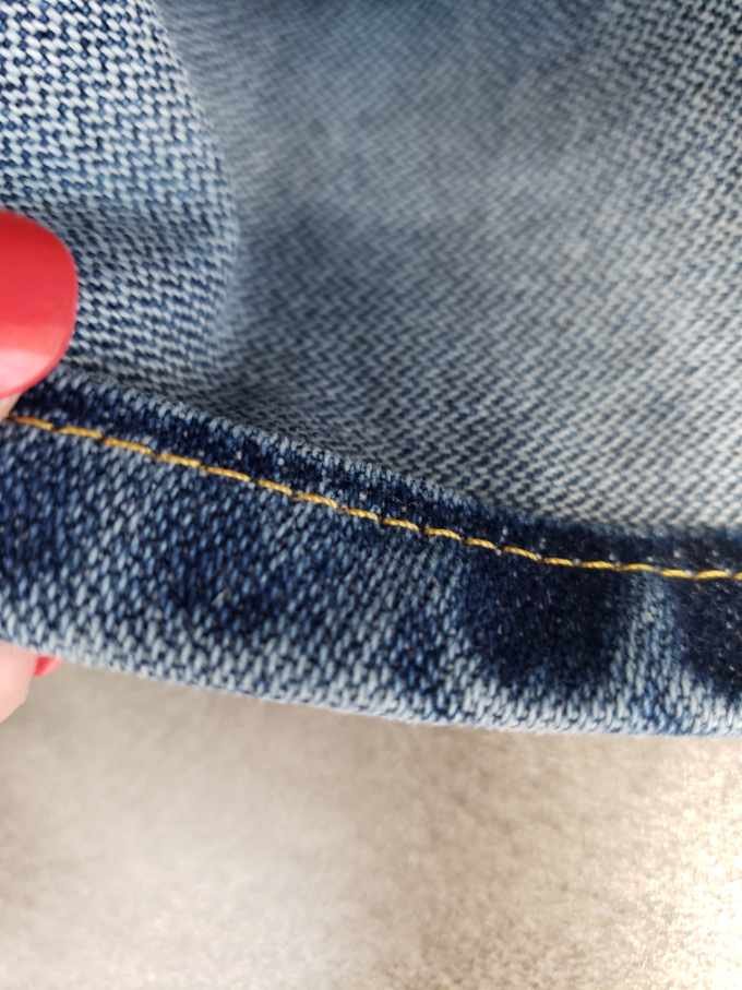 Hand finished jeans hem